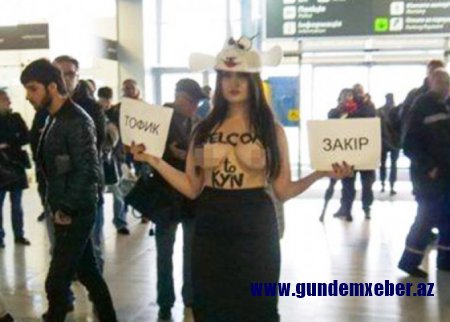 Kiyevdə çılpaq qadın bakılı sərnişinləri qarşıladı - “Buta Airways"in reklamı etirazlara səbəb oldu(FOTO)