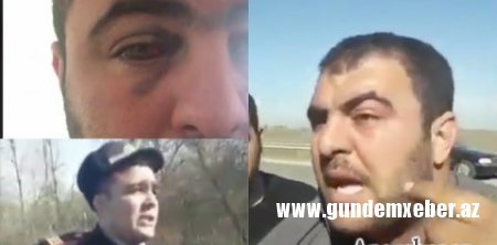 Yol polisi sürücünü yumruqladı və ana söyüşünə keçdi - Video