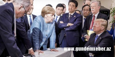 “Bloomberg”: Merkel Trampa sanksiya hazırlayır