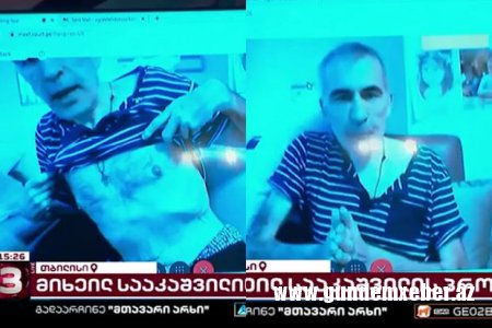 Saakaşvili məhkəmədə nə qədər arıqladığını nümayiş etdirdi - VİDEO