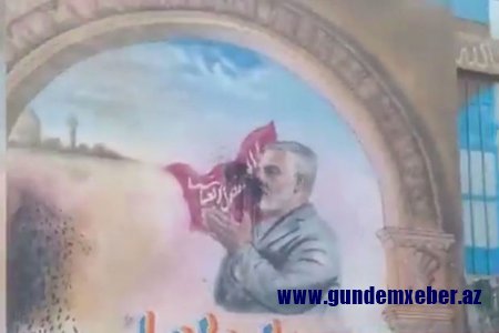 Qasim Süleymaninin divar rəsmi güneyli etirazçılar tərəfindən qan rənginə boyandı