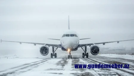 Yağan güclü qar Astana aeroportunun işini iflic edib