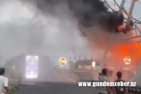 İranda yağış yağdı, əyləncə parkı alovlandı